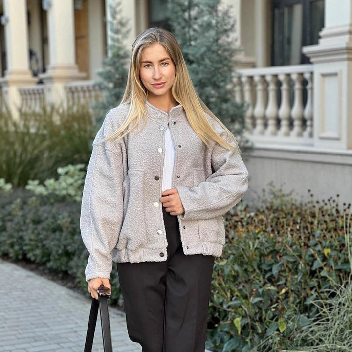 Women's teddy fleece bomber jacket in boxy cut with snap button closure and patch pockets Mune Fashion