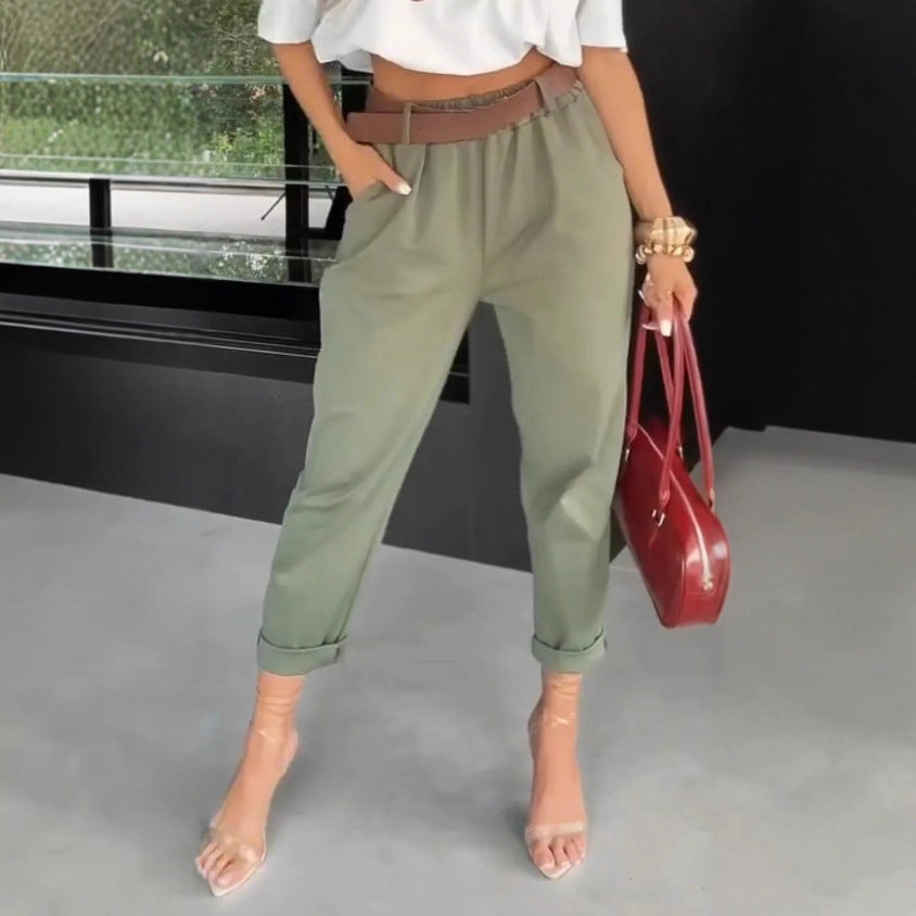 Women's high-waisted paperbag pants with gathered waistband, side pockets, and rolled hem Mune Fashion