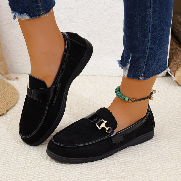 Ladies elegant suede slippers with decorative metal hardware and flexible easy-running sole Mune Fashion