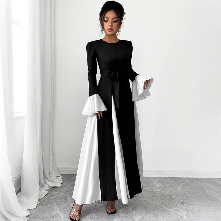 Ladies evening dress with fitted corset top, long sleeves and contrasting flounce cuffs Mune Fashion