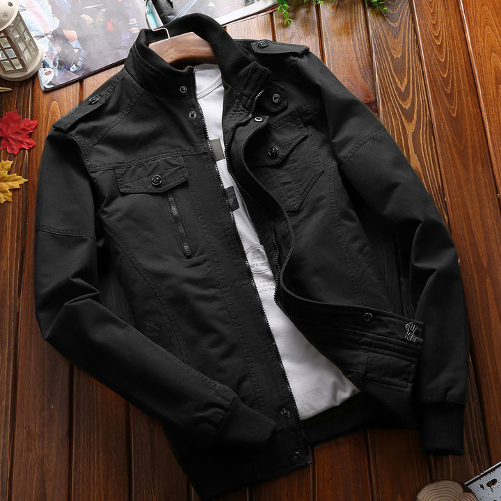 Men's lightweight canvas utility jacket with quilted lining, concealed two-way zipper, and elastic cuffs.