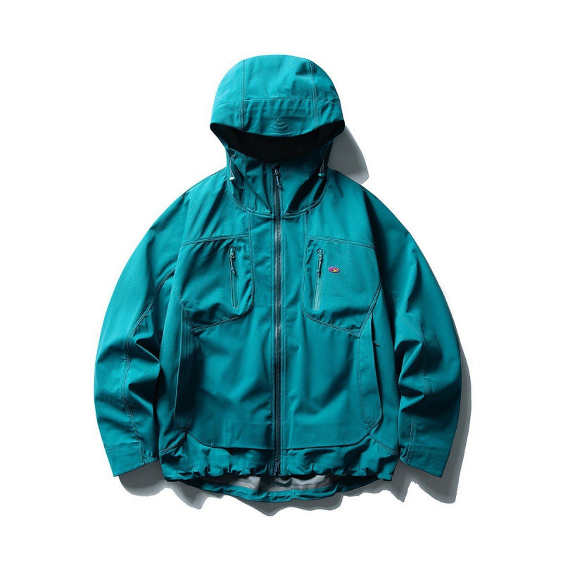 Unisex Technical Softshell Field Jacket with welded seams, four zippered pockets, and extended back part Mune Fashion