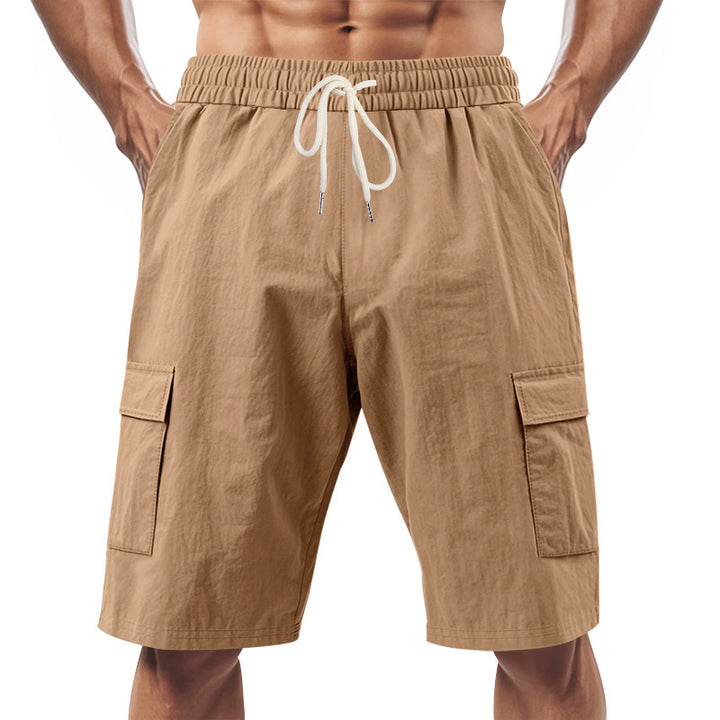 Men's technical cargo shorts with elastic drawstring waistband, secure flap pockets, and quick-drying functional material Mune Fashion