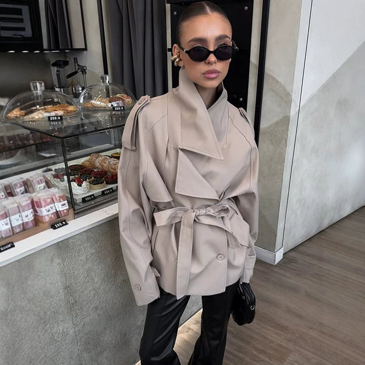 Women's short trench coat with wide standing collar, shoulder epaulettes, and waist belt Mune Fashion