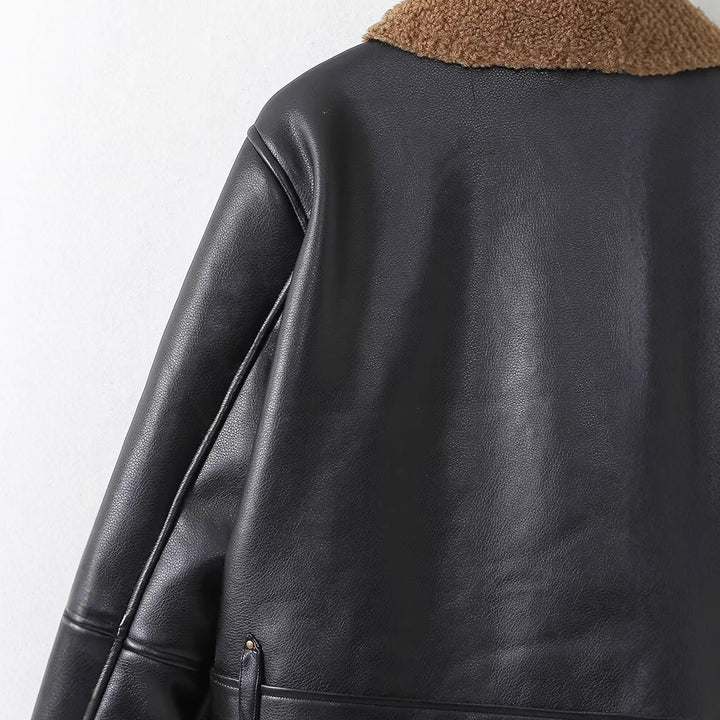 Women's short-cut aviator jacket in leather look with asymmetrical zipper and teddy lining Mune Fashion