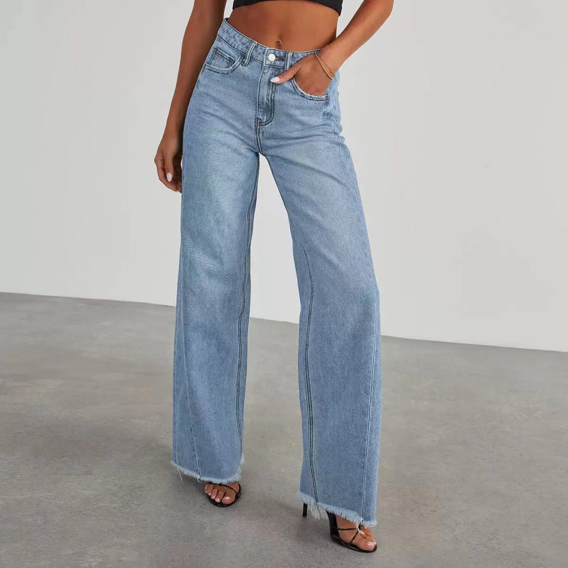 Women high-waist jeans with wide leg and frayed hem Mune Fashion
