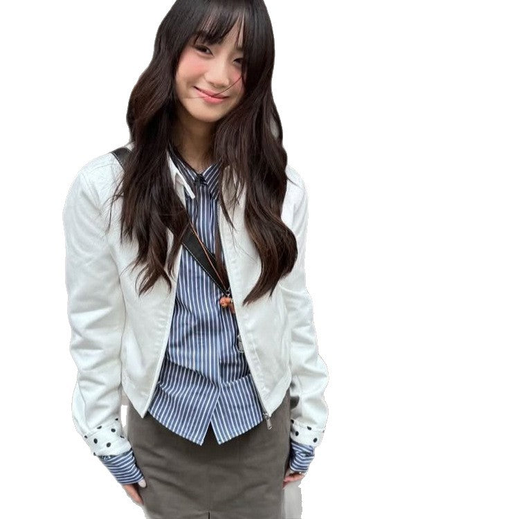 Women’s short-cut blouson jacket with stand-up collar, concealed zipper and contrasting polka dot patterned lining Mune Fashion