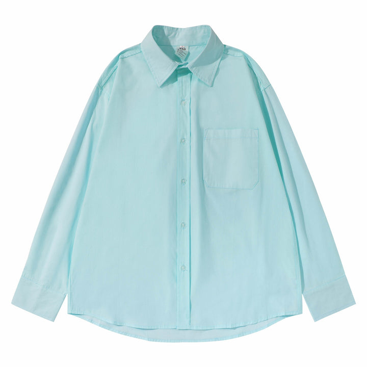 Unisex Boxy shirt with Kent collar, applied breast pocket and relaxed fit Mune Fashion