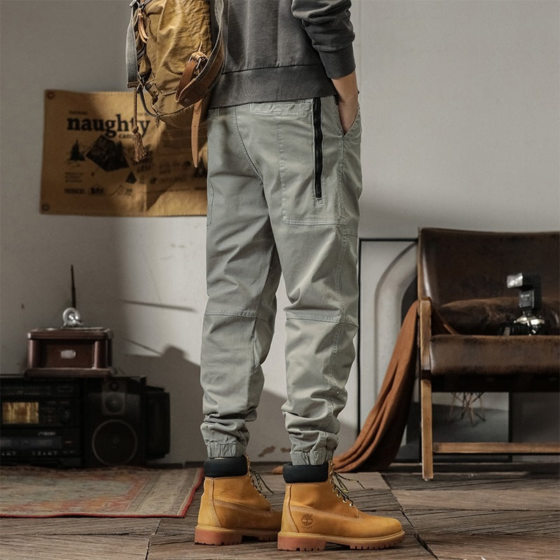 Men's tapered cargo pants in jogger style with knee seam details, drawstring & elastic cuffs