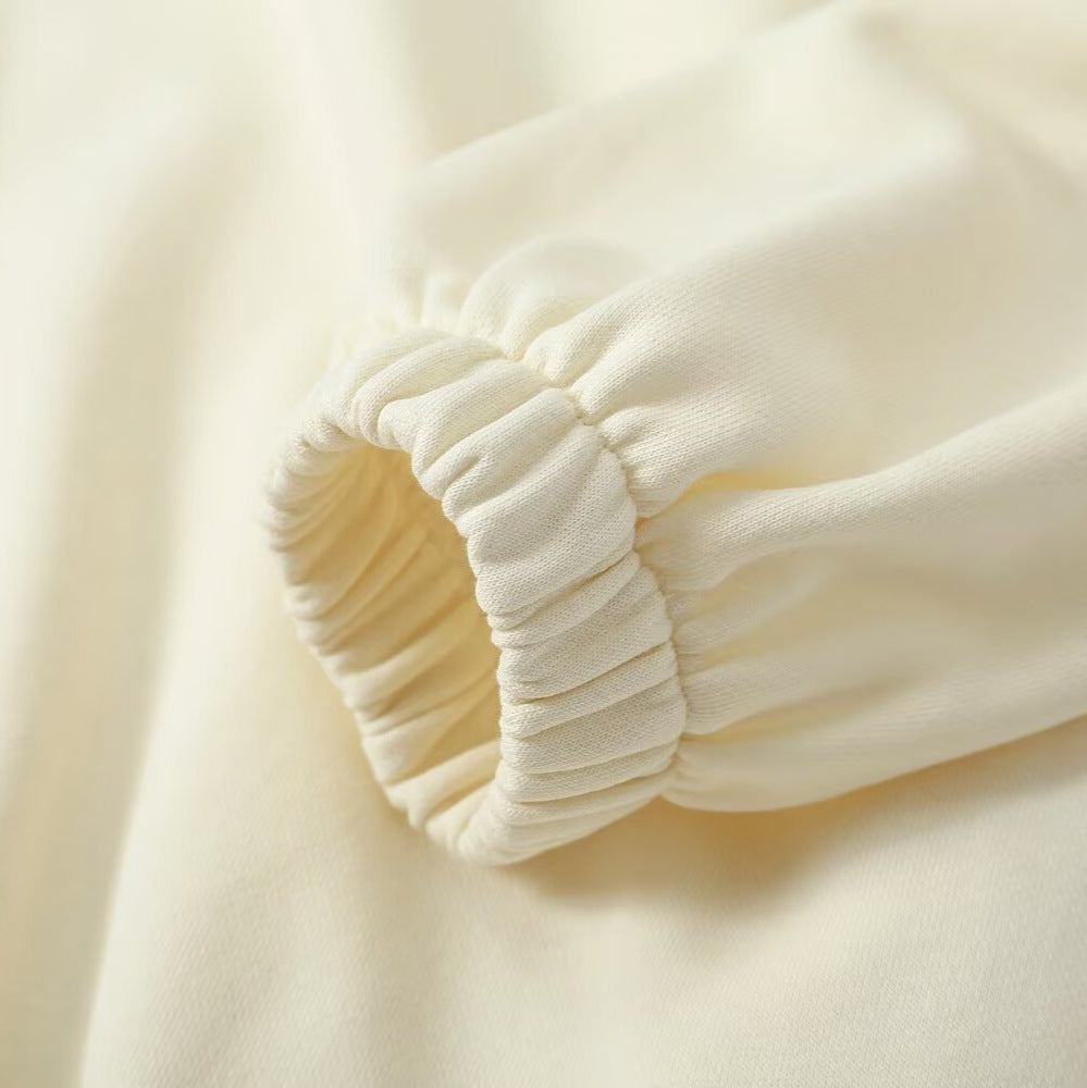 Women’s oversized pullover with half zip stand collar, elastic hem, and drop shoulders Mune Fashion