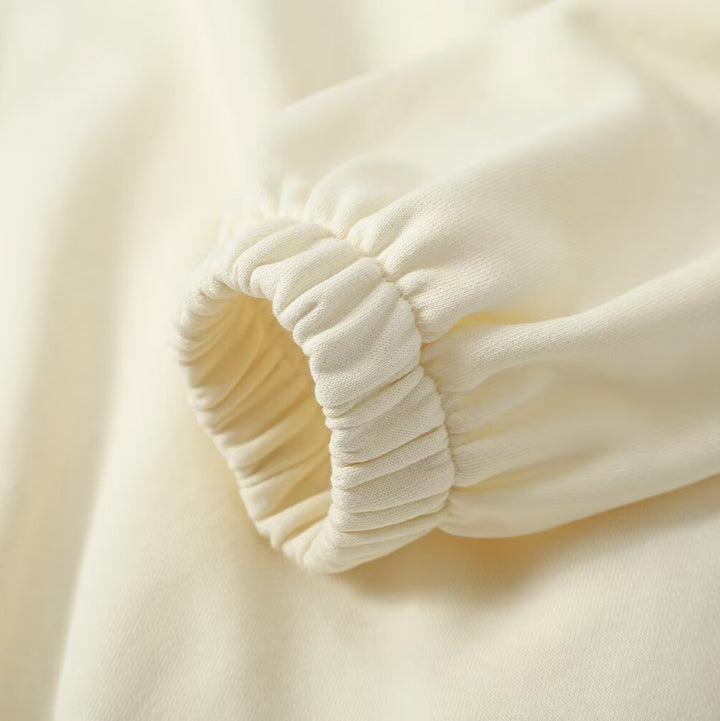 Women’s oversized pullover with half zip stand collar, elastic hem, and drop shoulders Mune Fashion