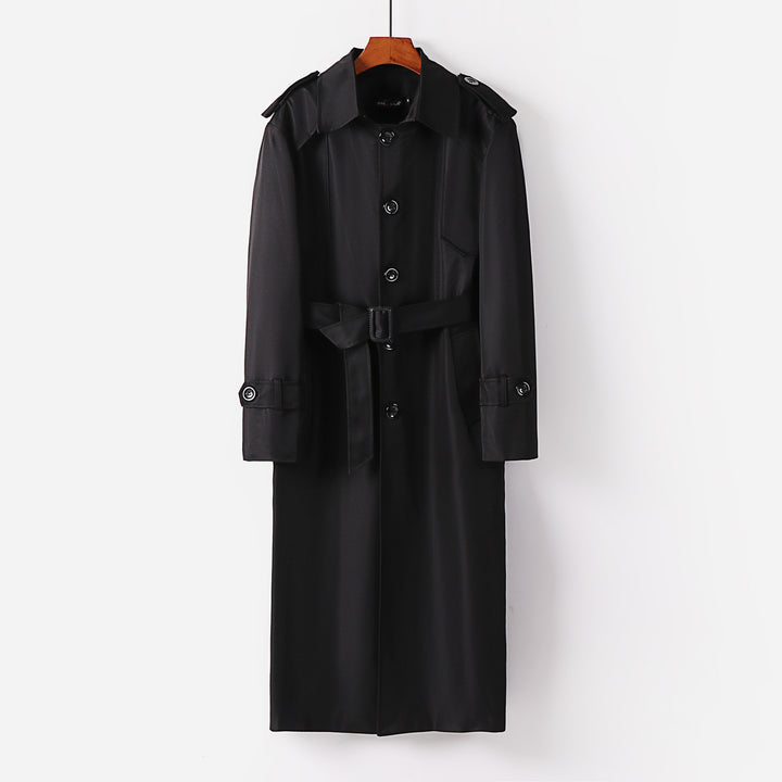 Women's longer classic trench coat with shoulder patches, button closure and adjustable cuffs Mune Fashion