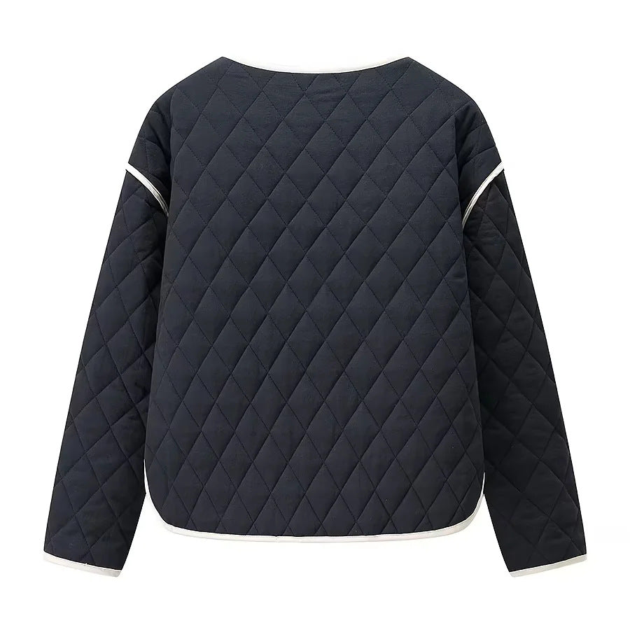 Women's quilted transition jacket with round neck oversized pockets and contrast piping Mune Fashion