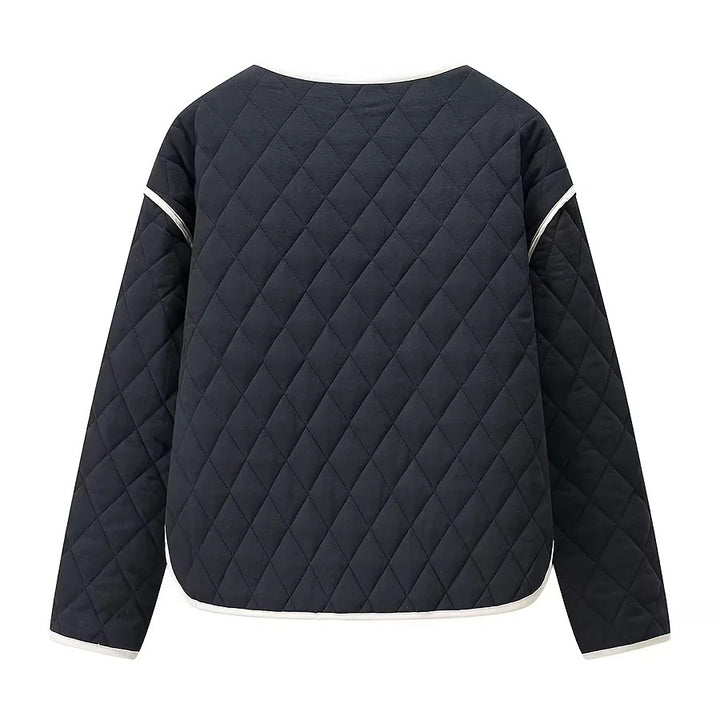 Women's quilted transition jacket with round neck oversized pockets and contrast piping Mune Fashion