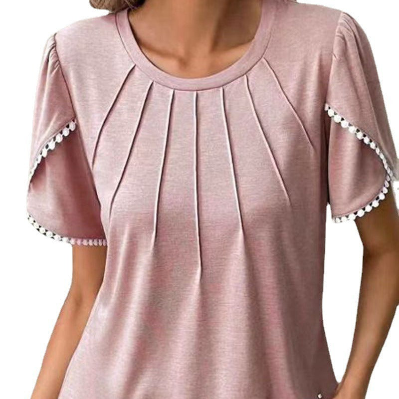 Women's round neck shirt with decorative pleated front, flutter sleeves and pompom trim Mune Fashion