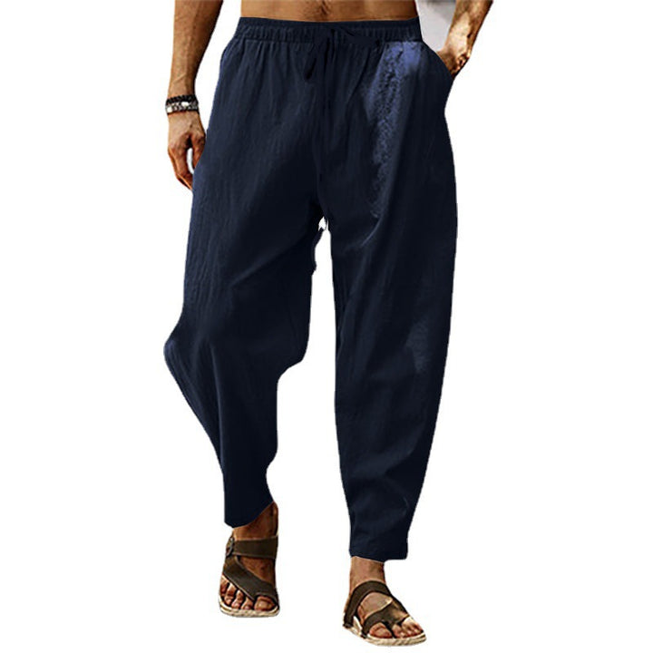 Men's relaxed summer slouch pants made of linen blend with elastic waistband and tapered ankle cuffs Mune Fashion
