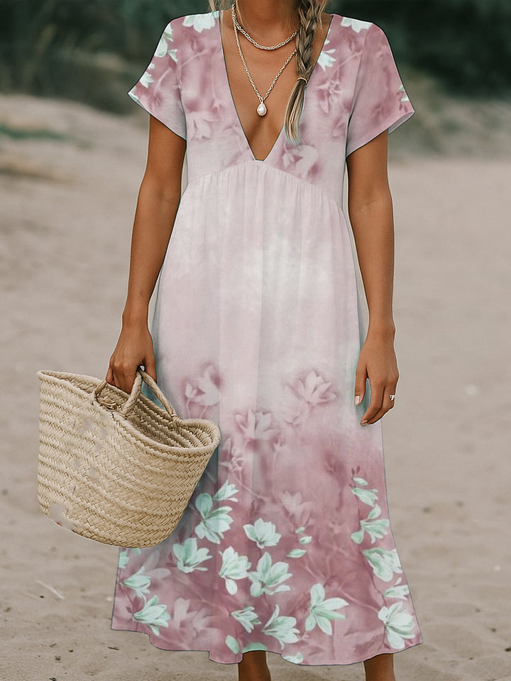 Ladies max dress with deep V-neck and flowing skirt Mune Fashion
