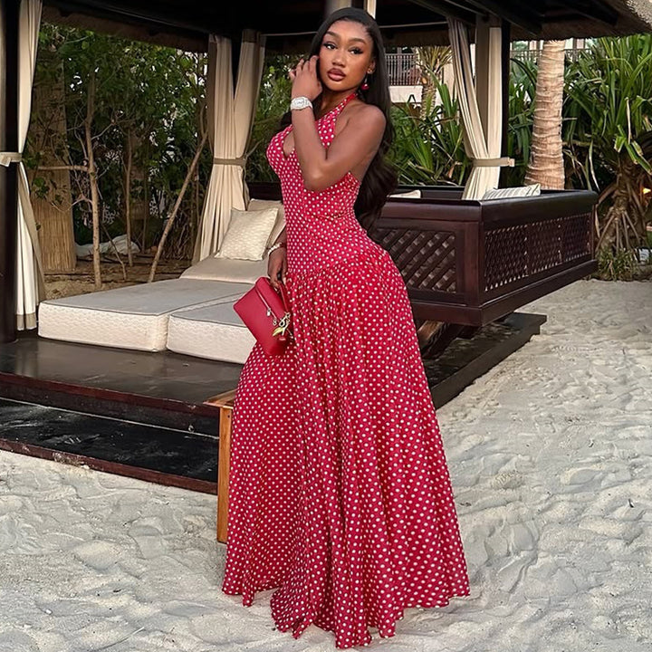 Ladies long halter dress with deep V-neck, tailored empire seam and flared layered skirt Mune Fashion