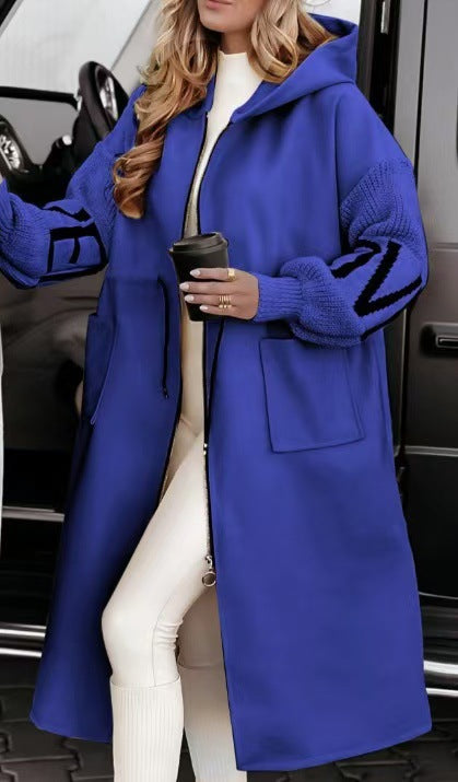 Women’s hooded coat with oversized cut, knitted sleeve cuffs and patch pockets Mune Fashion