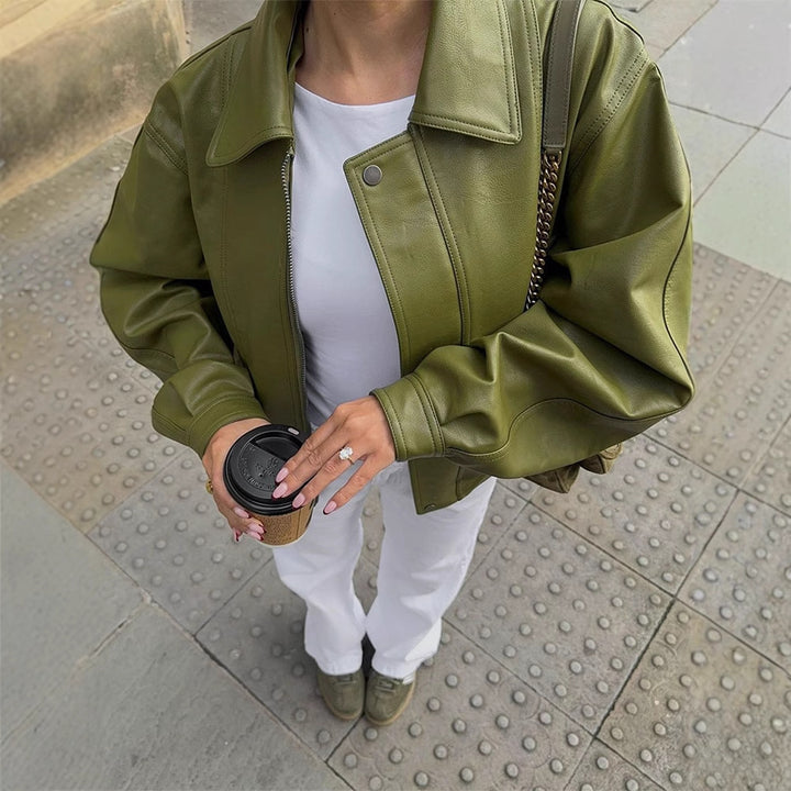 Women's Short Cut Oversized Faux Leather Jacket with Wide Kent Collar, Decorative Stitching and Concealed Zipper Placket Mune Fashion