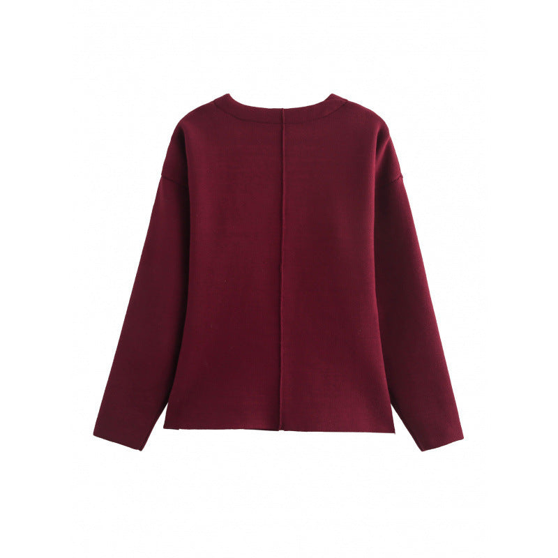 Women loosely fitted fine knit cardigan with deep V-neck and concealed button placket Mune Fashion