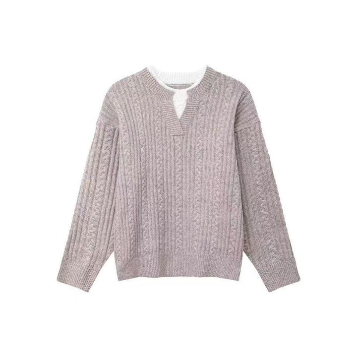 Women's chunky knitted cable pattern sweater with V-neck and layered look Mune Fashion