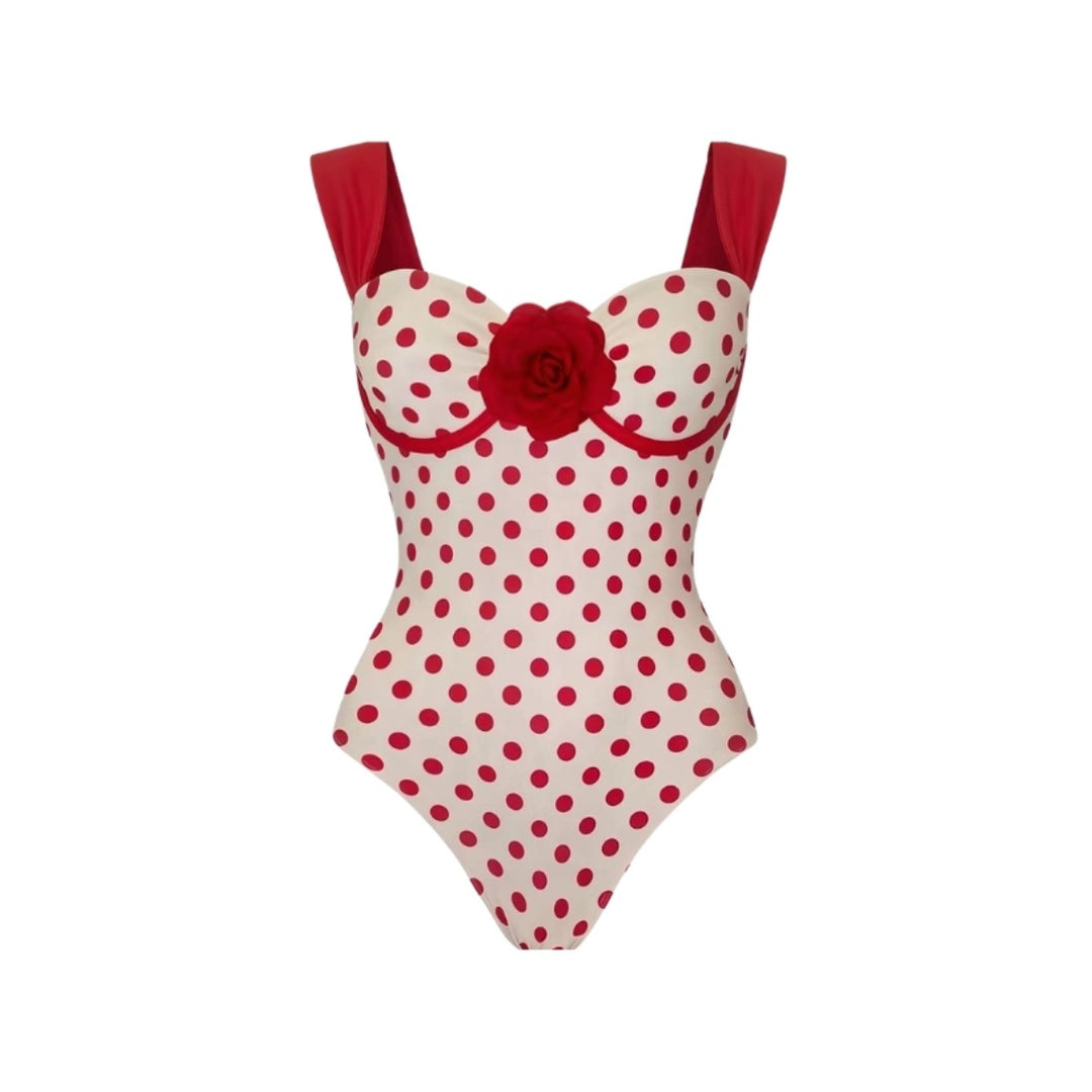 Women's swimsuit with playful polka dot pattern and decorative rose appliqué Mune Fashion