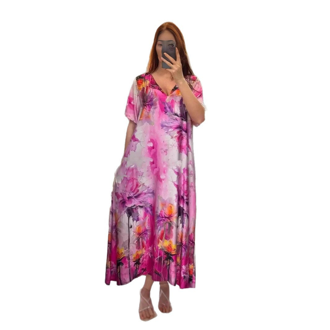 Women flowing maxi kaftan dress with V-neck and large watercolor floral print Mune Fashion