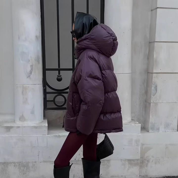 Ladies short padded oversized quilted jacket with high standing collar and hood Mune Fashion