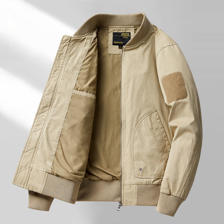 Men's short-cut lightweight bomber jacket with tactical sleeve patch and durable function shell Mune Fashion