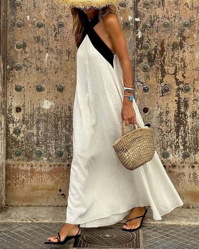 Women’s airy kaftan dress with crossed strap detail, breast yoke and wide fall Mune Fashion
