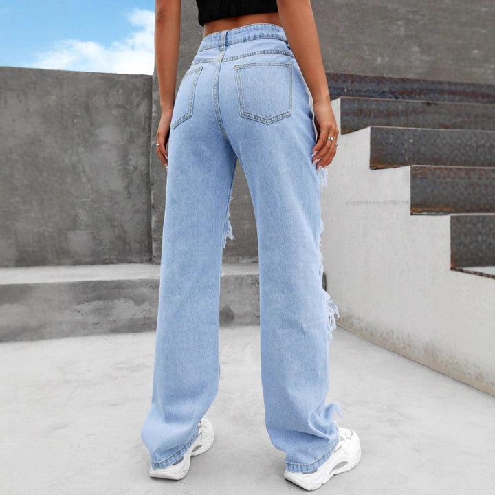 Women high-cut heavily ripped denim jeans with wide leg and decorative seam panels Mune Fashion