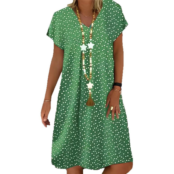 Ladies nan locker falling V-neck short dress with A-line cut, cap sleeves and all-over heart print Mune Fashion
