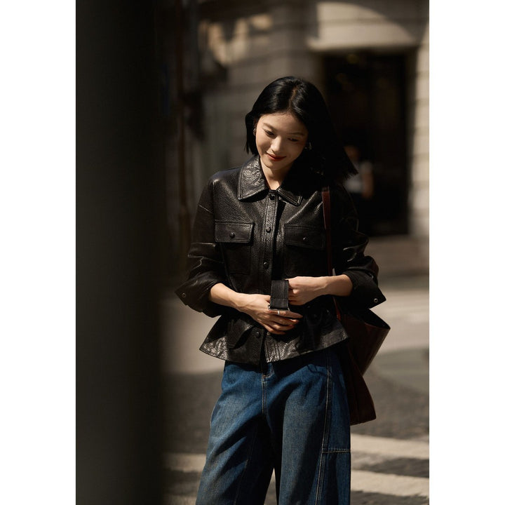Women's short jacket made of textured leather with waist belt and press studs Mune Fashion