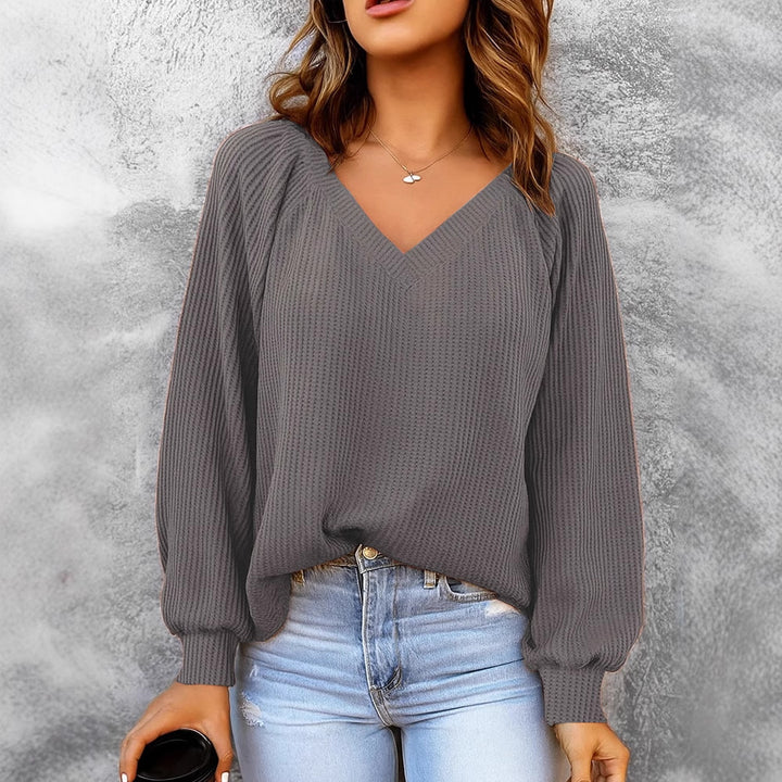 Women's fine structure knit sweater with V-neck, balloon sleeves, and ribbed cuffs Mune Fashion