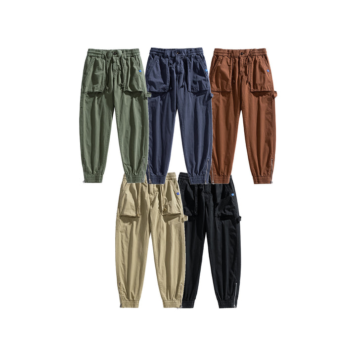 Men's workwear cargo pants in tech jogger style with applied front pockets, hammer loop, and ankle zippers Drune