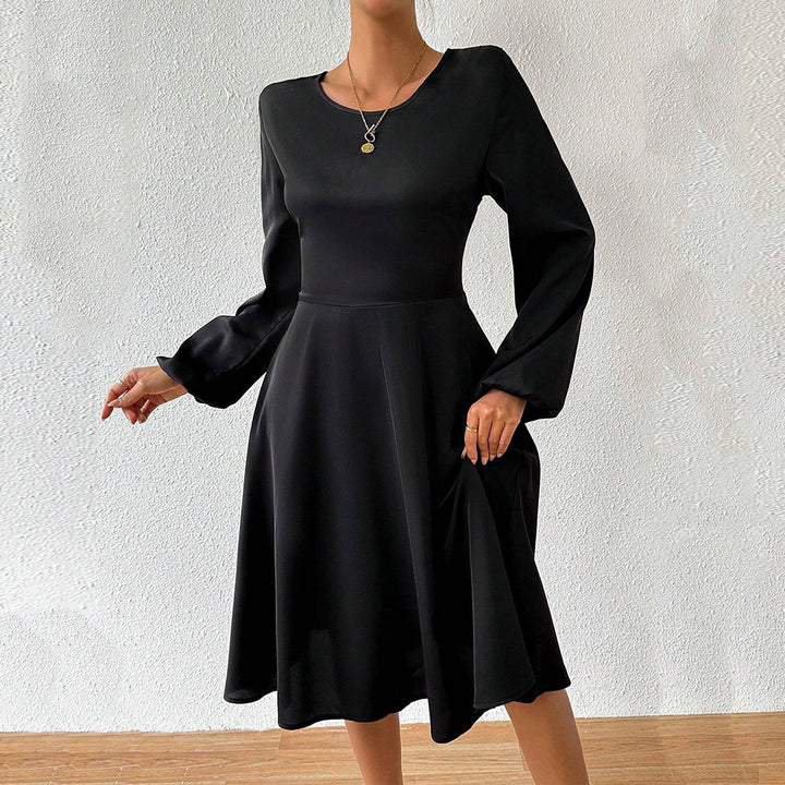 Women's elegant midi dress with tailored corset look, flared A-line skirt, and long flared sleeves Mune Fashion