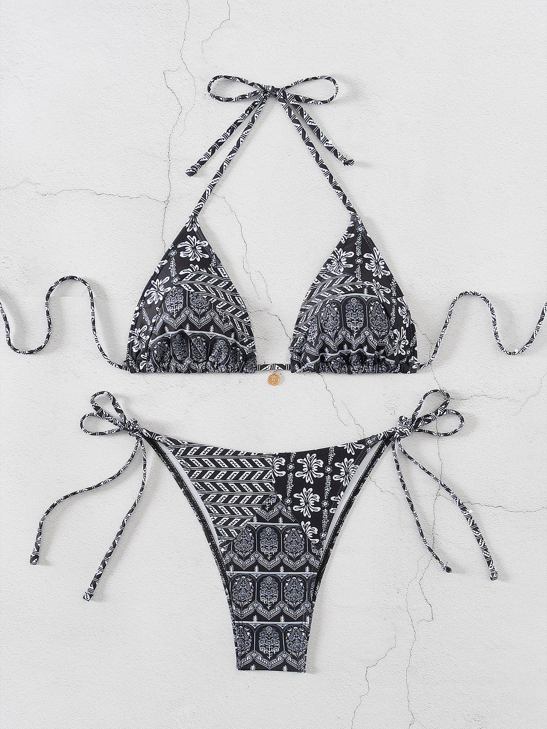 Women's triangle bikini with playful floral design and adjustable straps Mune Fashion