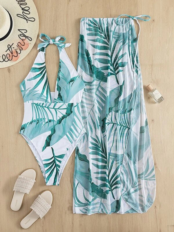 Women's set with a one-piece swimsuit featuring floral design and matching sarong Mune Fashion