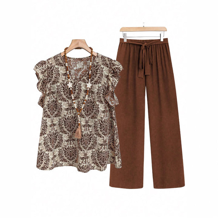 Women's two-piece ensemble with ruffled print blouse and wide waist trousers model Mune Fashion