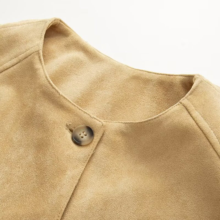 Women's short jacket in velour look with round neckline, balloon sleeves, and elastic hem Mune Fashion