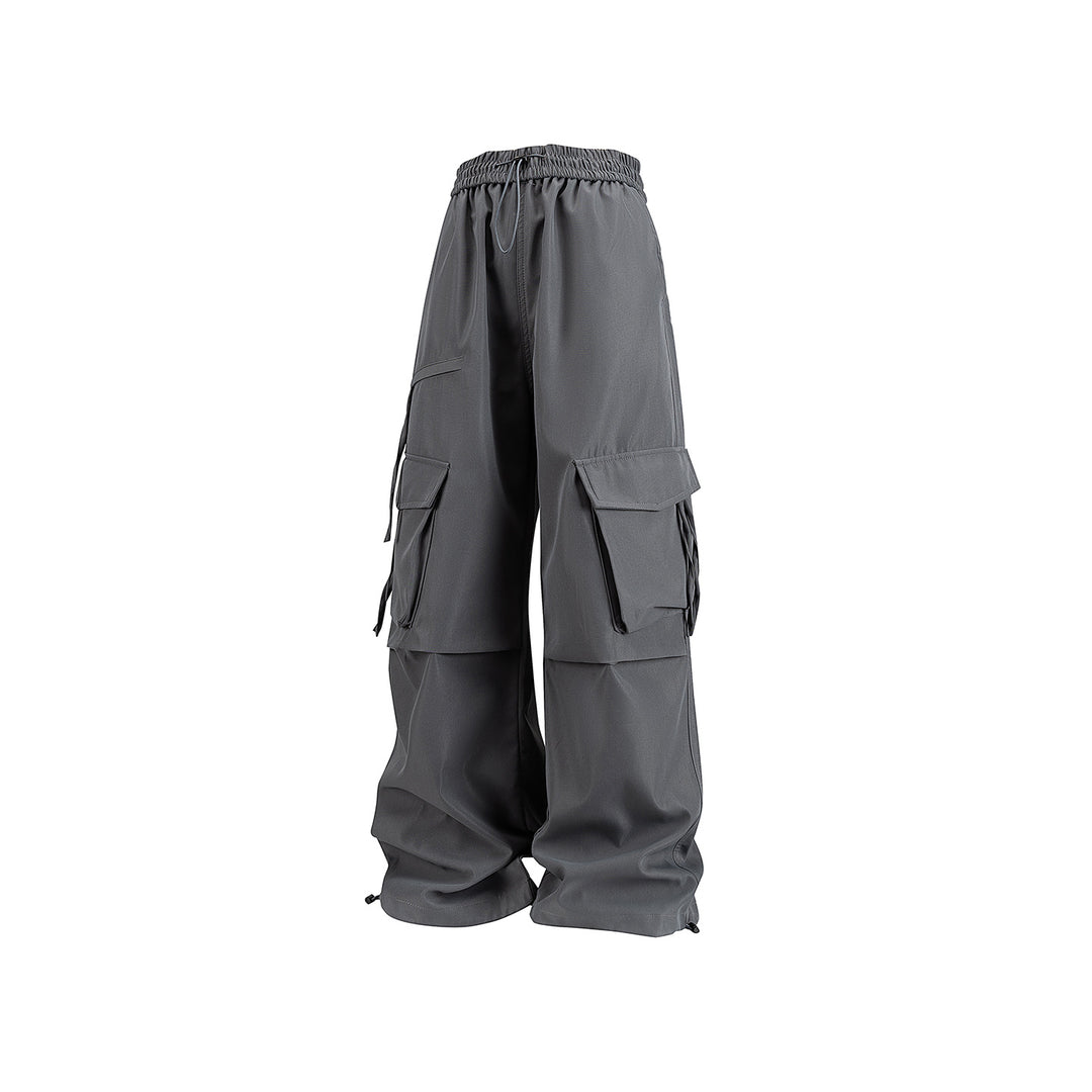 Damen Weite Cargo‑Hose im Baggy‑Cut mit elastischem Tunnelzugbund, Klapp‑Utility‑Taschen und verstellbarem Beinabschluss Mune Fashion