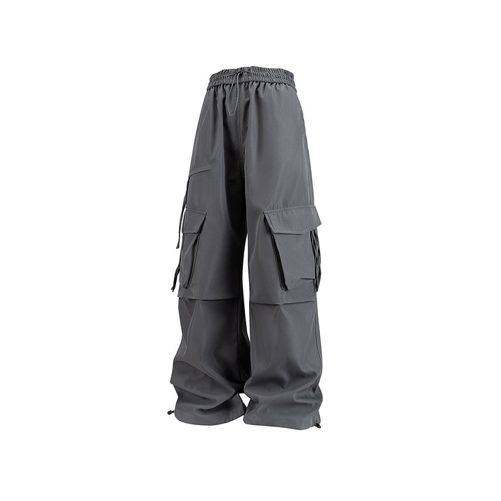Damen Weite Cargo‑Hose im Baggy‑Cut mit elastischem Tunnelzugbund, Klapp‑Utility‑Taschen und verstellbarem Beinabschluss Mune Fashion