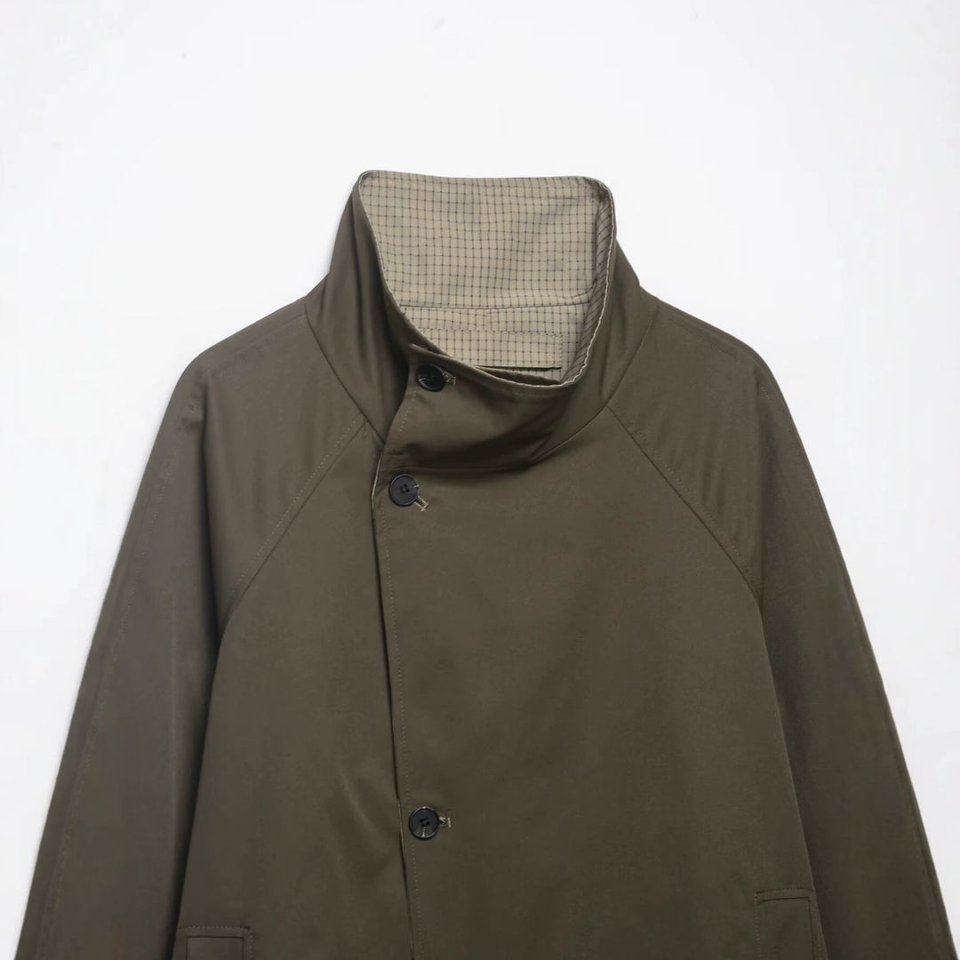 Men's short water-repellent transitional jacket with high stand-up collar, asymmetrical button placket, and raglan sleeves Mune Fashion
