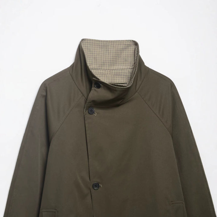 Men's short water-repellent transitional jacket with high stand-up collar, asymmetrical button placket, and raglan sleeves Mune Fashion