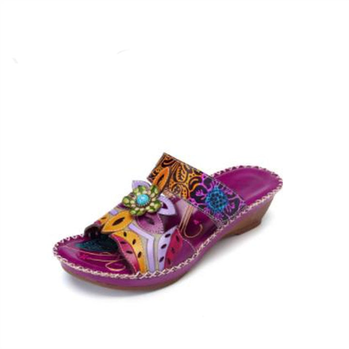 Ladies wedge slide with floral decor and handcrafted leather applications Mune Fashion