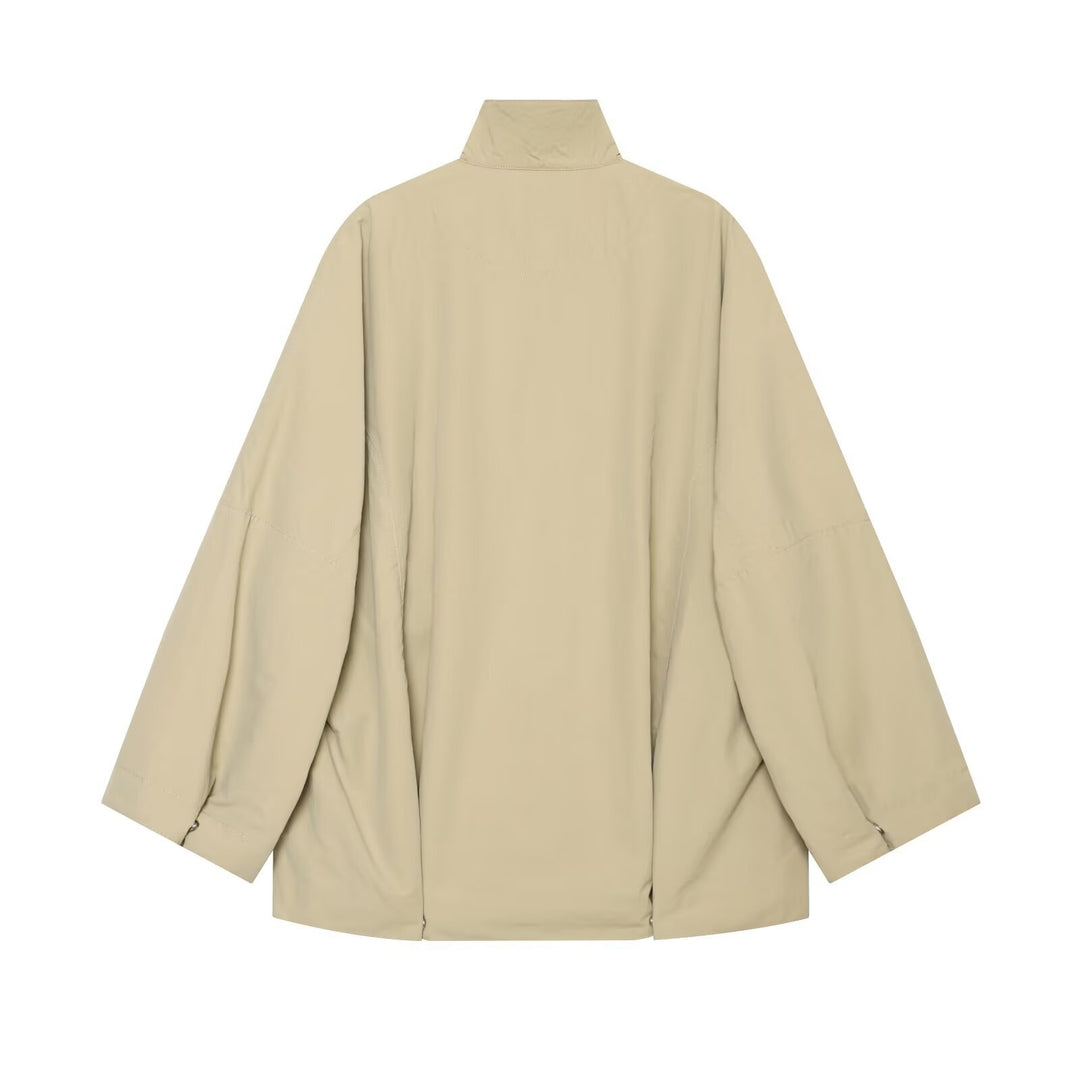 Women Oversized Rain Jacket in Cape Style with Stand-Up Collar and Snap Button Placket Mune Fashion