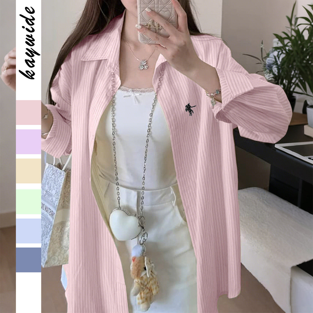 Women's oversized shirt with fine pinstripe structure, Kent collar, rounded hem, and buttoned cuffs Mune Fashion