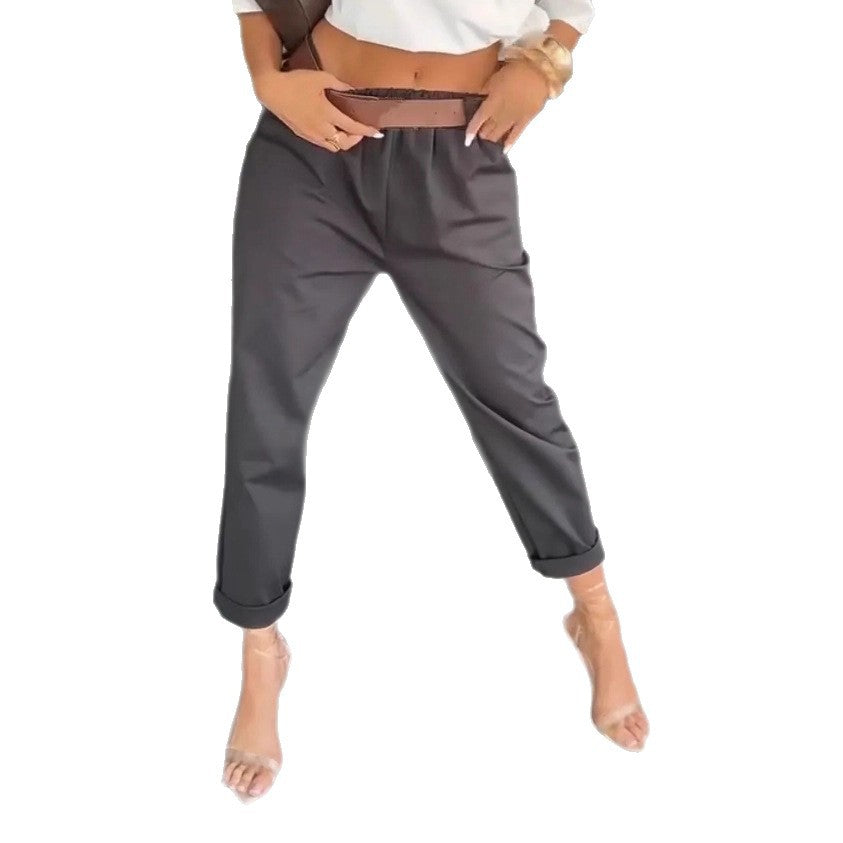 Women's high-waisted paperbag pants with gathered waistband, side pockets, and rolled hem Mune Fashion