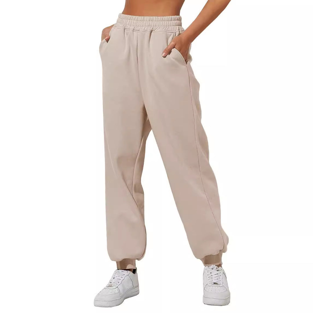 Women's relaxed high-waist jogging pants with double-layer comfort waistband, side pockets, and gathered ankle cuffs Mune Fashion